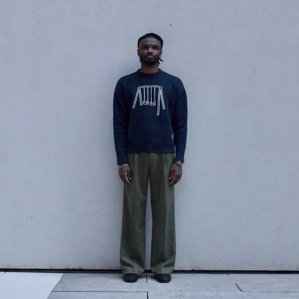 The New-Ivy Knit Sweater